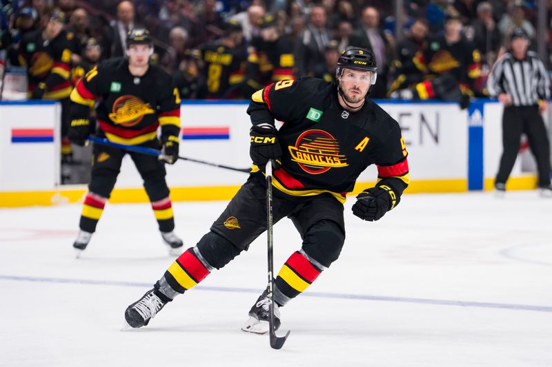 Dec 7, 2023; Vancouver, British Columbia, CAN; Vancouver Canucks forward J.T. Miller (9) skates against the Minnesota Wild in the third period at Rogers Arena. Vancouver won 2-0.  Mandatory Credit: Bob Frid-USA TODAY Sports