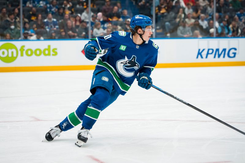 Oct 13, 2025; Vancouver, British Columbia, CAN; Vancouver Canucks forward Braeden Cootes (80) skates against the St. Louis Blues in the third period at Rogers Arena. Mandatory Credit: Bob Frid-Imagn Images