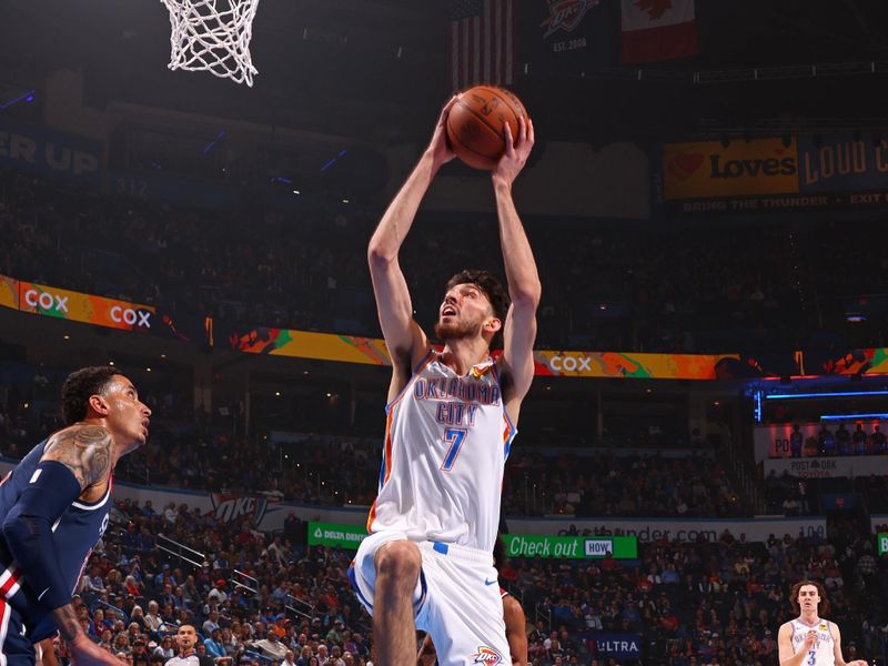 OKLAHOMA CITY, OK - FEBRUARY 23: Chet Holmgren #7 of the Oklahoma City Thunder drives to the basket during the game against the Washington Wizards on February 23, 2024 at Paycom Arena in Oklahoma City, Oklahoma. NOTE TO USER: User expressly acknowledges and agrees that, by downloading and or using this photograph, User is consenting to the terms and conditions of the Getty Images License Agreement. Mandatory Copyright Notice: Copyright 2024 NBAE (Photo by Zach Beeker/NBAE via Getty Images)