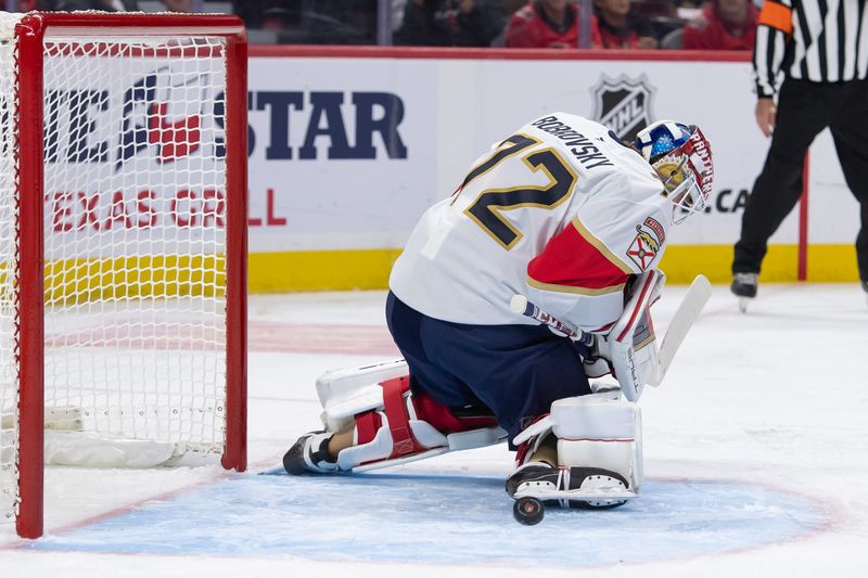 Oct 10, 2024; Ottawa, Ontario, CAN; Florida Panthers goalie Sergei Bobrovsky (72) makes a save in the first period against the Ottawa Senators at the Canadian Tire Centre. Mandatory Credit: Marc DesRosiers-Imagn Images