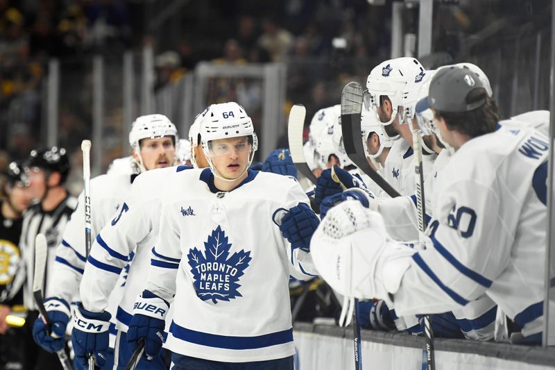 Apr 20, 2024; Boston, Massachusetts, USA; Toronto Maple Leafs center David Kampf (64) celebrates his goal with his teammates during the third period in game one of the first round of the 2024 Stanley Cup Playoffs against the Boston Bruins at TD Garden. Mandatory Credit: Bob DeChiara-USA TODAY Sports