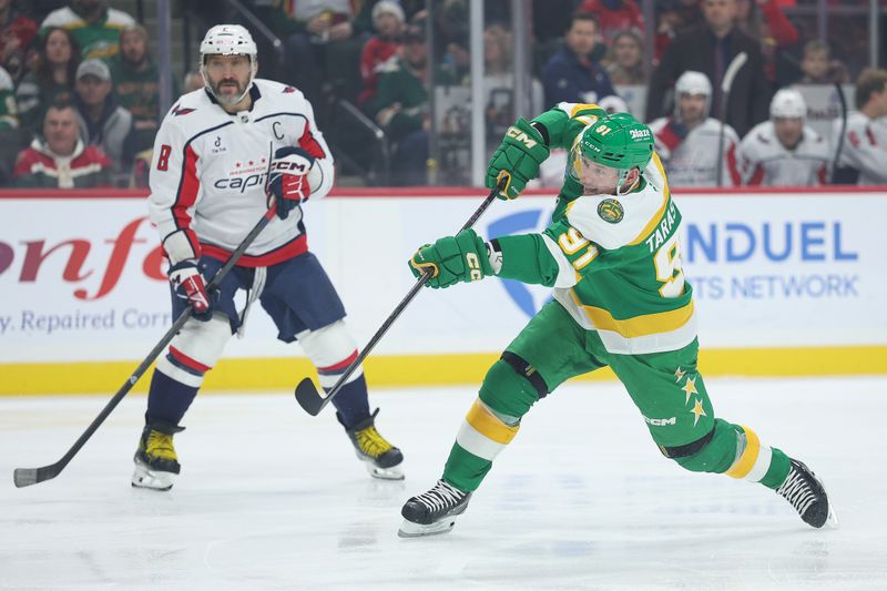 Dec 16, 2025; Saint Paul, Minnesota, USA; Minnesota Wild right wing Vladimir Tarasenko (91) shoots the puck against the Washington Capitals during the first period at Grand Casino Arena. Mandatory Credit: Matt Krohn-Imagn Images