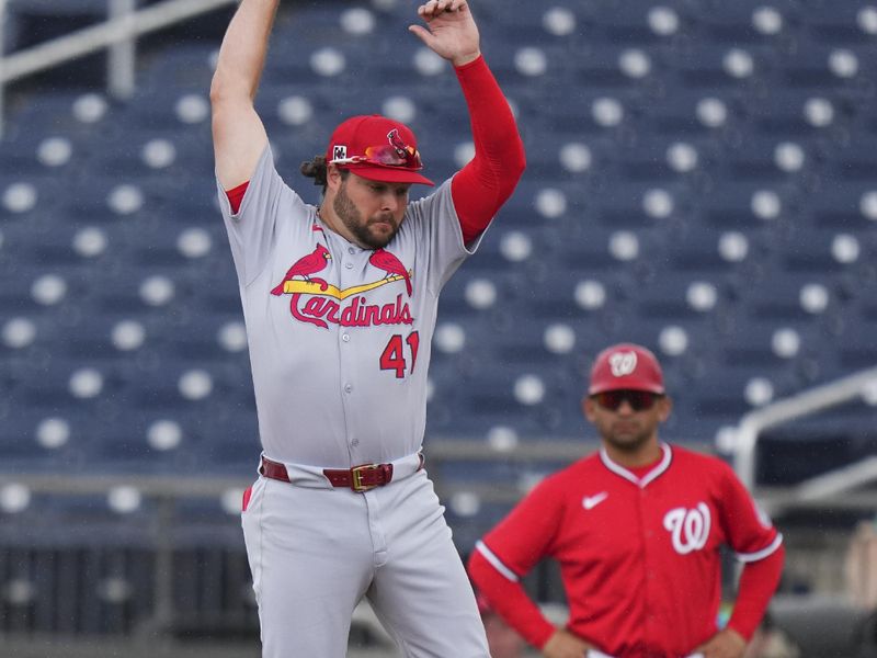 Mar 4, 2025; West Palm Beach, Florida, USA; St. Louis Cardinals outfielder Alec Burleson (41) catches the ball at first for an out during the third inning at CACTI Park of the Palm Beaches. Mandatory Credit: Rich Storry-Imagn Images