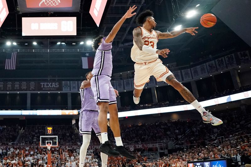 Feb 19, 2024; Austin, Texas, USA; Texas Longhorns forward Dillon Mitchell (23) passes the ball during the second half against the Kansas State Wildcats at Moody Center. Mandatory Credit: Scott Wachter-USA TODAY Sports