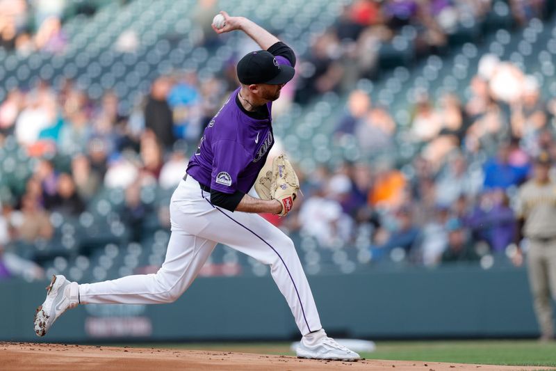 Apr 22, 2024; Denver, Colorado, USA; Colorado Rockies starting pitcher Austin Gomber (26) pitches in the first inning against the San Diego Padres at Coors Field. Mandatory Credit: Isaiah J. Downing-USA TODAY Sports