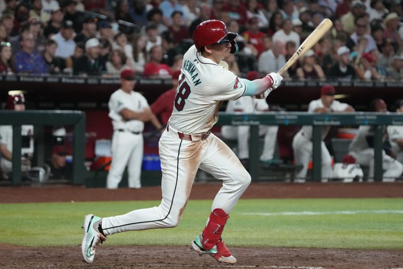 Aug 11, 2024; Phoenix, Arizona, USA; Arizona Diamondbacks shortstop Kevin Newman (18) hits an RBI double against the Philadelphia Phillies in the sixth inning at Chase Field. Mandatory Credit: Rick Scuteri-USA TODAY Sports