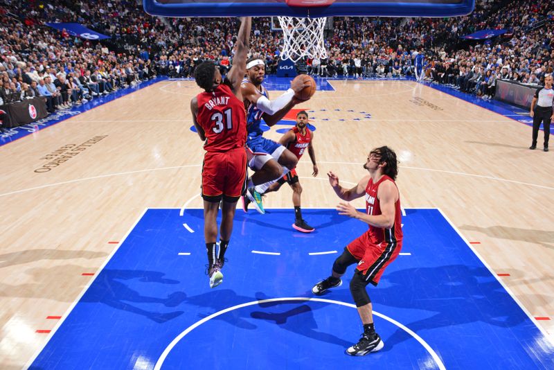 PHILADELPHIA, PA - MARCH 18: Buddy Heild #17 of the Philadelphia 76ers drives to the basket during the game against the Miami Heat on March 18, 2024 at the Wells Fargo Center in Philadelphia, Pennsylvania NOTE TO USER: User expressly acknowledges and agrees that, by downloading and/or using this Photograph, user is consenting to the terms and conditions of the Getty Images License Agreement. Mandatory Copyright Notice: Copyright 2024 NBAE (Photo by Jesse D. Garrabrant/NBAE via Getty Images)