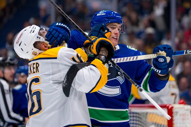 Apr 21, 2024; Vancouver, British Columbia, CAN; Vancouver Canucks defenseman Nikita Zadorov (91) wrestles with Nashville Predators forward Jason Zucker (16) in the second period in game one of the first round of the 2024 Stanley Cup Playoffs at Rogers Arena. Mandatory Credit: Bob Frid-USA TODAY Sports