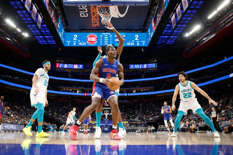 DETROIT, MI - JANUARY 03: Jalen Duren #0 of the Detroit Pistons handles the ball during the game against the Charlotte Hornets  on January 03, 2025 at Little Caesars Arena in Detroit, Michigan. NOTE TO USER: User expressly acknowledges and agrees that, by downloading and/or using this photograph, User is consenting to the terms and conditions of the Getty Images License Agreement. Mandatory Copyright Notice: Copyright 2025 NBAE (Photo by Brian Sevald/NBAE via Getty Images)