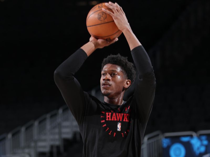 MILWAUKEE, WI - DECEMBER 4: De'Andre Hunter #12 of the Atlanta Hawks warms up before the game against the Milwaukee Bucks during a regular season game on December 4, 2024 at Fiserv Forum Center in Milwaukee, Wisconsin. NOTE TO USER: User expressly acknowledges and agrees that, by downloading and or using this Photograph, user is consenting to the terms and conditions of the Getty Images License Agreement. Mandatory Copyright Notice: Copyright 2024 NBAE (Photo by Gary Dineen/NBAE via Getty Images).