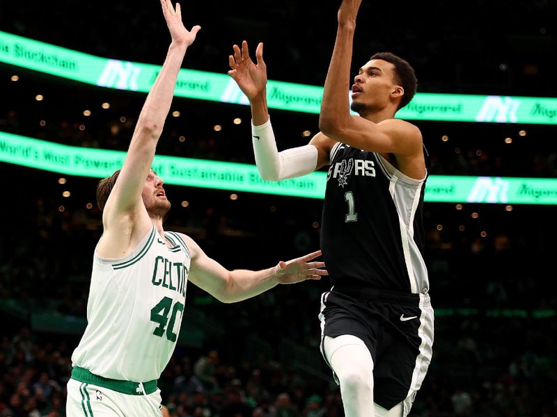 BOSTON, MASSACHUSETTS - JANUARY 17: Victor Wembanyama #1 of the San Antonio Spurs takes a shot against Luke Kornet #40 of the Boston Celtics during the first half at TD Garden on January 17, 2024 in Boston, Massachusetts. The Celtics defeat the Spurs 117-98. NOTE TO USER: User expressly acknowledges and agrees that, by downloading and or using this photograph, user is consenting to the terms and conditions of the Getty Images License Agreement.  (Photo by Maddie Meyer/Getty Images)