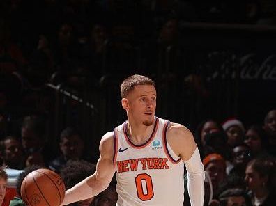 NEW YORK, NY - DECEMBER 25: Donte Divincenzo #0 of the New York Knicks looks to pass the ball during the game against the Milwaukee Bucks on December 25, 2023 at Madison Square Garden in New York City, New York.  NOTE TO USER: User expressly acknowledges and agrees that, by downloading and or using this photograph, User is consenting to the terms and conditions of the Getty Images License Agreement. Mandatory Copyright Notice: Copyright 2023 NBAE  (Photo by Nathaniel S. Butler/NBAE via Getty Images)