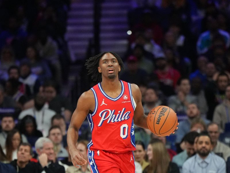 PHILADELPHIA, PA - FEBRUARY 23: Tyrese Maxey #0 of the Philadelphia 76ers dribbles the ball during the game against the Cleveland Cavaliers on February 23, 2024 at the Wells Fargo Center in Philadelphia, Pennsylvania NOTE TO USER: User expressly acknowledges and agrees that, by downloading and/or using this Photograph, user is consenting to the terms and conditions of the Getty Images License Agreement. Mandatory Copyright Notice: Copyright 2024 NBAE (Photo by Jesse D. Garrabrant/NBAE via Getty Images)