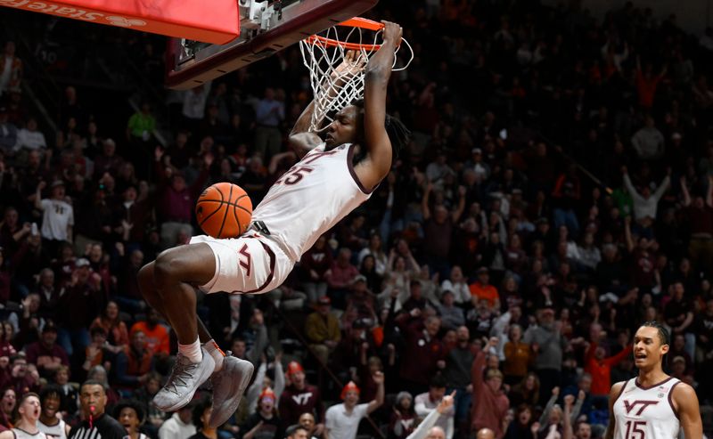 Jan 28, 2023; Blacksburg, Virginia, USA; Virginia Tech Hokies forward Justyn Mutts (25) dunks in the second half against the Syracuse Orange at Cassell Coliseum. Mandatory Credit: Lee Luther Jr.-USA TODAY Sports