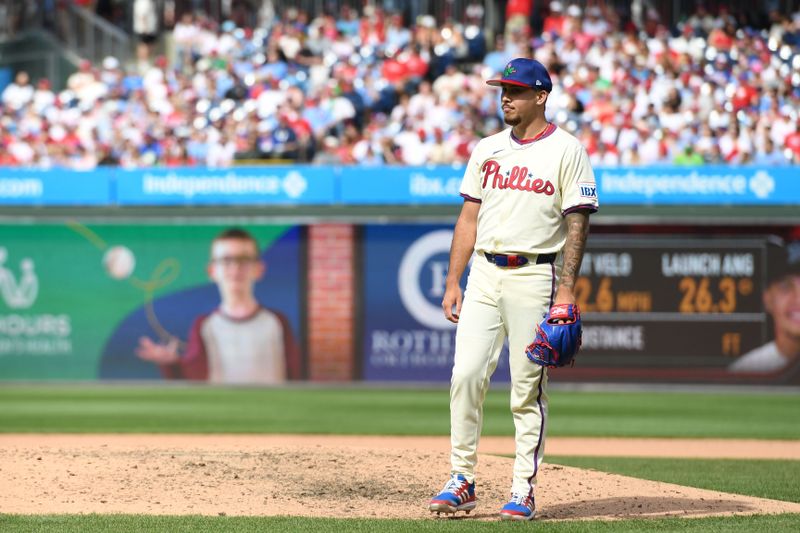 Apr 20, 2025; Philadelphia, Pennsylvania, USA; Philadelphia Phillies pitcher Orion Kerkering (50) reacts after allowing a three-run home run during the eighth inning against the Miami Marlins at Citizens Bank Park. Mandatory Credit: Eric Hartline-Imagn Images