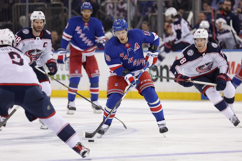 Feb 28, 2024; New York, New York, USA; New York Rangers left wing Artemi Panarin (10) skates with the puck against Columbus Blue Jackets defenseman Ivan Provorov (9) and center Boone Jenner (38) and defenseman Damon Severson (78) during the second period at Madison Square Garden. Mandatory Credit: Brad Penner-USA TODAY Sports