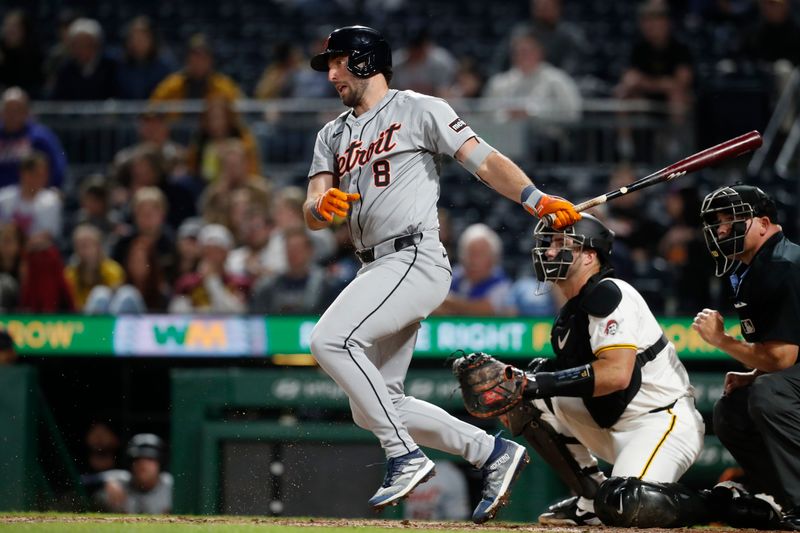 Apr 8, 2024; Pittsburgh, Pennsylvania, USA;  Detroit Tigers  right fielder Matt Vierling (8) hits an RBI single against the Pittsburgh Pirates during the eighth inning at PNC Park. Mandatory Credit: Charles LeClaire-USA TODAY Sports