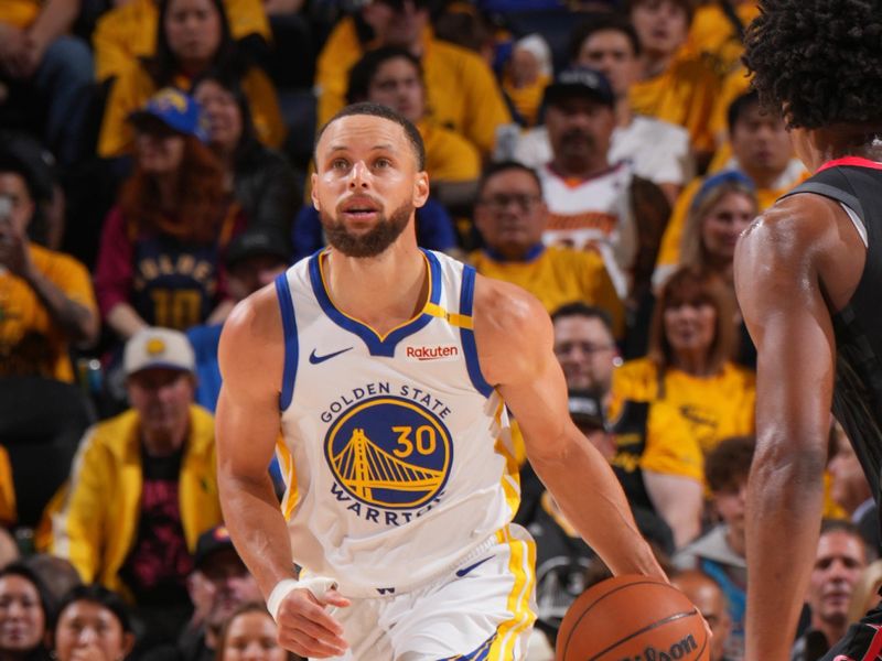 SAN FRANCISCO, CA - APRIL 26:  Stephen Curry #30 of the Golden State Warriors dribbles the ball during the game against the Houston Rockets  during Round 1 Game 3 of the 2025 NBA Playoffs   on April 26, 2025 at Chase Center in San Francisco, California. NOTE TO USER: User expressly acknowledges and agrees that, by downloading and or using this photograph, user is consenting to the terms and conditions of Getty Images License Agreement. Mandatory Copyright Notice: Copyright 2025 NBAE (Photo by Jesse D. Garrabrant/NBAE via Getty Images)