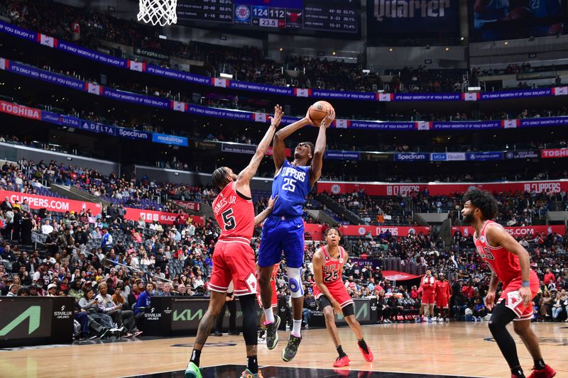 LOS ANGELES, CA - MARCH 27: Moussa Diabate #25 of the LA Clippers drives to the basket during the game against the Chicago Bulls on March 27, 2023 at Crypto.Com Arena in Los Angeles, California. NOTE TO USER: User expressly acknowledges and agrees that, by downloading and/or using this Photograph, user is consenting to the terms and conditions of the Getty Images License Agreement. Mandatory Copyright Notice: Copyright 2023 NBAE (Photo by Adam Pantozzi/NBAE via Getty Images)