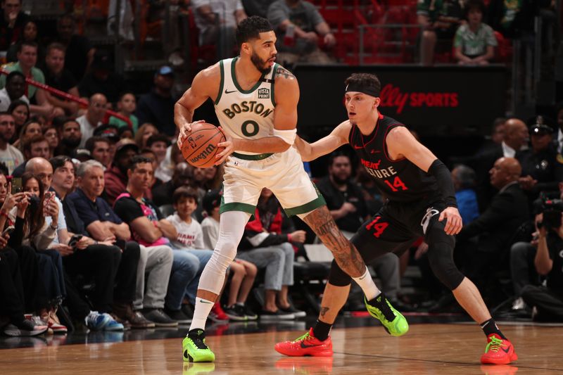 MIAMI, FL - FEBRUARY 11: Jayson Tatum #0 of the Boston Celtics handles the ball during the game against the Miami Heat on February 11, 2024 at Kaseya Center in Miami, Florida. NOTE TO USER: User expressly acknowledges and agrees that, by downloading and or using this Photograph, user is consenting to the terms and conditions of the Getty Images License Agreement. Mandatory Copyright Notice: Copyright 2024 NBAE (Photo by Issac Baldizon/NBAE via Getty Images)