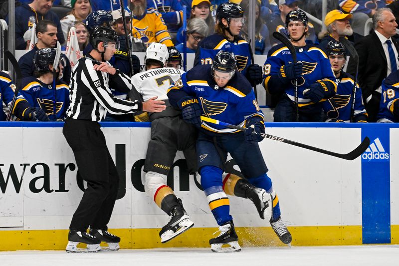 Dec 6, 2023; St. Louis, Missouri, USA;  St. Louis Blues right wing Kevin Hayes (12) checks Vegas Golden Knights defenseman Alex Pietrangelo (7) during the second period at Enterprise Center. Mandatory Credit: Jeff Curry-USA TODAY Sports