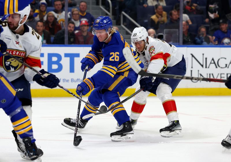 Oct 28, 2024; Buffalo, New York, USA;  Buffalo Sabres defenseman Rasmus Dahlin (26) takes a shot on goal and scores during the second period against the Florida Panthers at KeyBank Center. Mandatory Credit: Timothy T. Ludwig-Imagn Images