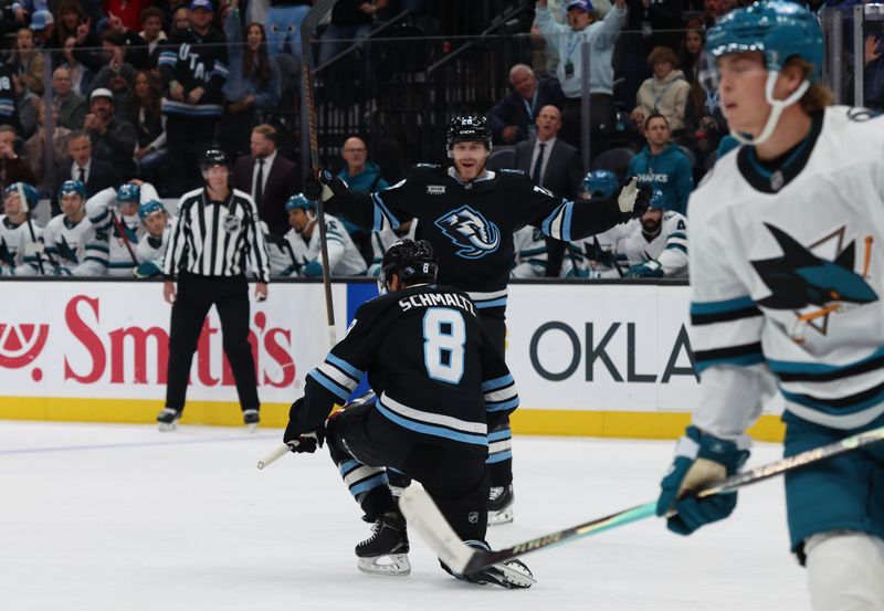 Oct 17, 2025; Salt Lake City, Utah, USA; Utah Mammoth center Nick Schmaltz (8) celebrates scoring a goal with defenseman Olli Määttä (2) during the first period of a game against the San Jose Sharks at Delta Center. Mandatory Credit: Rob Gray-Imagn Images