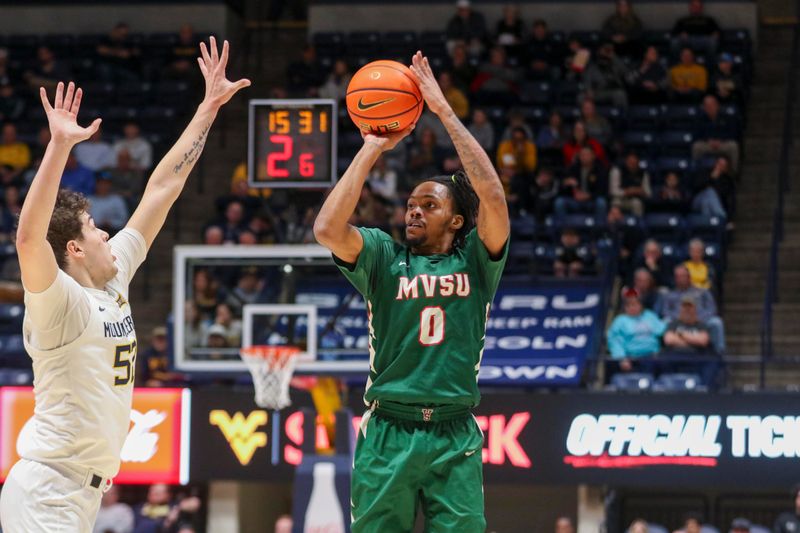 Dec 22, 2025; Morgantown, West Virginia, USA; Mississippi Valley State Delta Devils guard Patrick Punch (0) shoots a three pointer over West Virginia Mountaineers guard Treysen Eaglestaff (52) during the first half at Hope Coliseum. Mandatory Credit: Ben Queen-Imagn Images