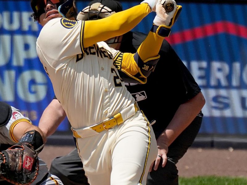 May 15, 2024; Milwaukee, Wisconsin, USA; Milwaukee Brewers catcher William Contreras (24) hits a three-run home run during the third inning of their game against the Pittsburgh Pirates at American Family Field. Mandatory Credit: Mark Hoffman-USA TODAY Sports