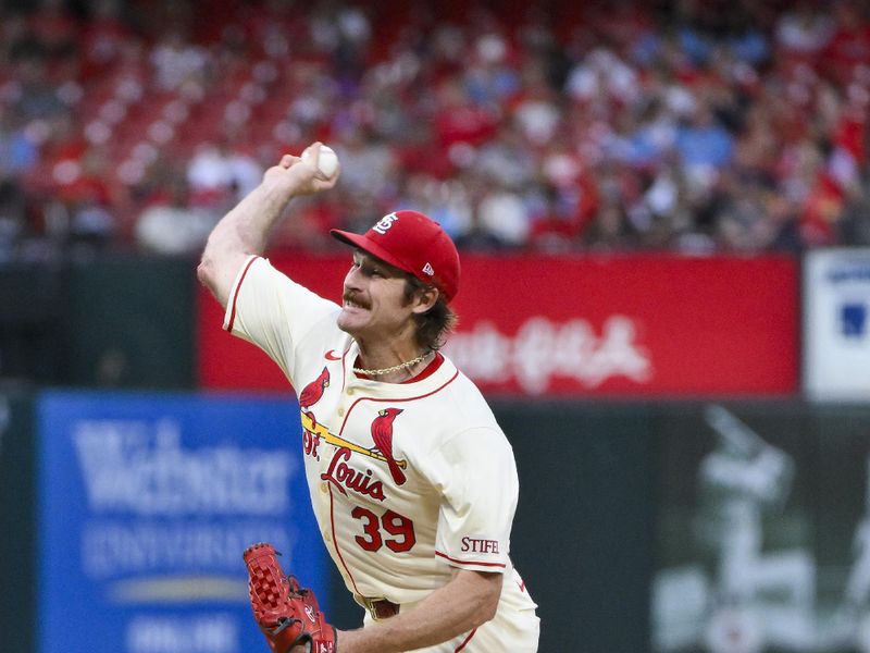 Sep 21, 2024; St. Louis, Missouri, USA;  St. Louis Cardinals starting pitcher Miles Mikolas (39) pitches against the Cleveland Guardians during the first inning at Busch Stadium. Mandatory Credit: Jeff Curry-Imagn Images