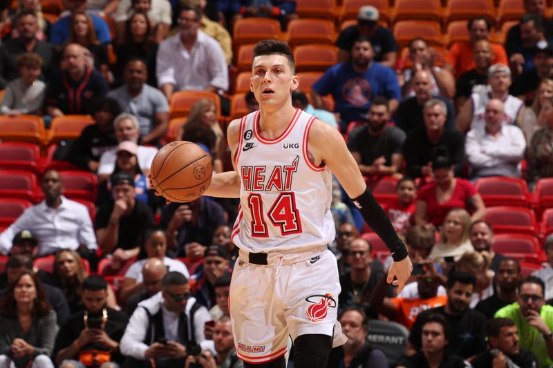 MIAMI, FL - MARCH 3: Tyler Herro #14 of the Miami Heat dribbles the ball during the game against the New York Knicks on March 3, 2023 at Miami-Dade Arena in Miami, Florida. NOTE TO USER: User expressly acknowledges and agrees that, by downloading and or using this Photograph, user is consenting to the terms and conditions of the Getty Images License Agreement. Mandatory Copyright Notice: Copyright 2023 NBAE (Photo by Issac Baldizon/NBAE via Getty Images)