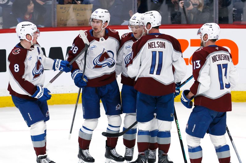 Mar 14, 2026; Winnipeg, Manitoba, CAN; Colorado Avalanche center Martin Necas (88) celebrates a goal against the Winnipeg Jets in the third period at Canada Life Centre. Mandatory Credit: James Carey Lauder-Imagn Images