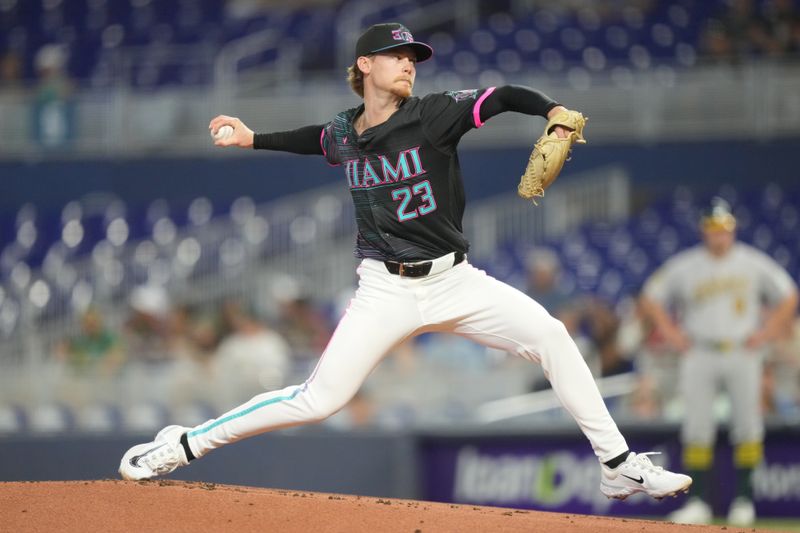 May 3, 2025; Miami, Florida, USA;  Miami Marlins pitcher Max Meyer (23) pitches in the first inning against the Oakland Athletics at loanDepot Park. Mandatory Credit: Jim Rassol-Imagn Images