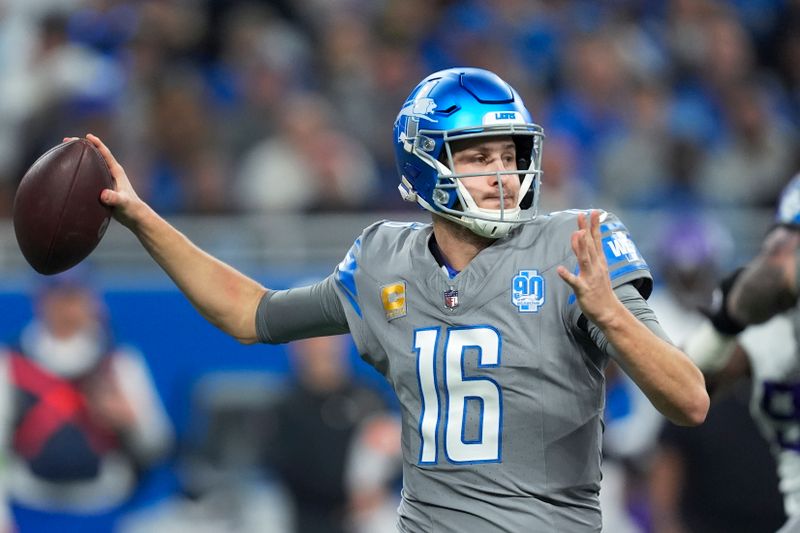 Detroit Lions quarterback Jared Goff (16) throws against the Minnesota Vikings in the first half of an NFL football game in Detroit, Sunday, Jan. 7, 2024. (AP Photo/Paul Sancya)