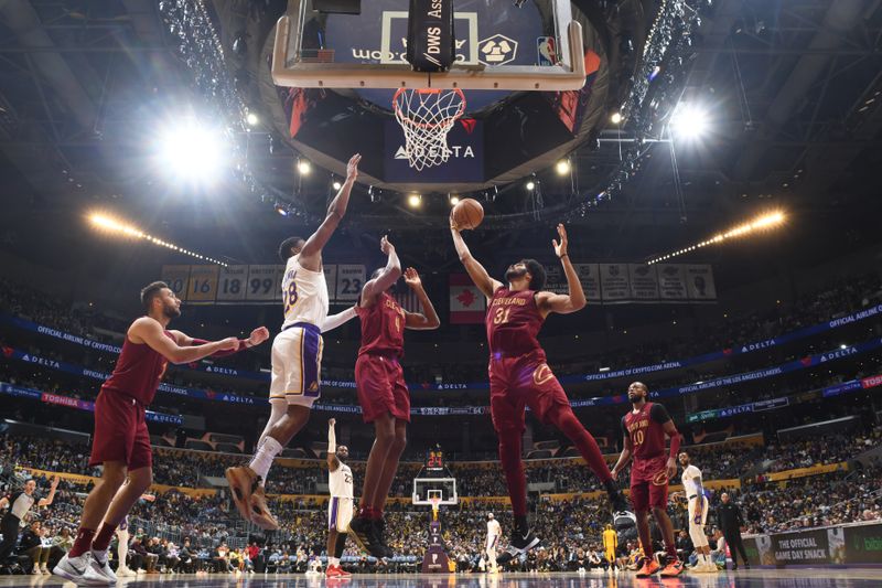 LOS ANGELES, CA - APRIL 6: Jarrett Allen #31 of the Cleveland Cavaliers grabs a rebound during the game against the Los Angeles Lakers on April 6, 2024 at Crypto.Com Arena in Los Angeles, California. NOTE TO USER: User expressly acknowledges and agrees that, by downloading and/or using this Photograph, user is consenting to the terms and conditions of the Getty Images License Agreement. Mandatory Copyright Notice: Copyright 2024 NBAE (Photo by Adam Pantozzi/NBAE via Getty Images)