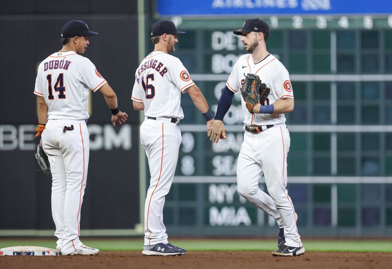 Aug 12, 2023; Houston, Texas, USA; Houston Astros right fielder Kyle Tucker (30) celebrates with shortstop Grae Kessinger (16) after the game against the Los Angeles Angels at Minute Maid Park. Mandatory Credit: Troy Taormina-USA TODAY Sports