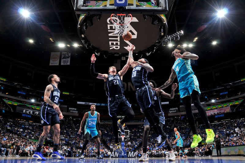 ORLANDO, FL - MARCH 19: Markelle Fultz #20 of the Orlando Magic rebounds during the game against the Charlotte Hornets on March 19, 2024 at the Kia Center in Orlando, Florida. NOTE TO USER: User expressly acknowledges and agrees that, by downloading and or using this photograph, User is consenting to the terms and conditions of the Getty Images License Agreement. Mandatory Copyright Notice: Copyright 2024 NBAE (Photo by Fernando Medina/NBAE via Getty Images)