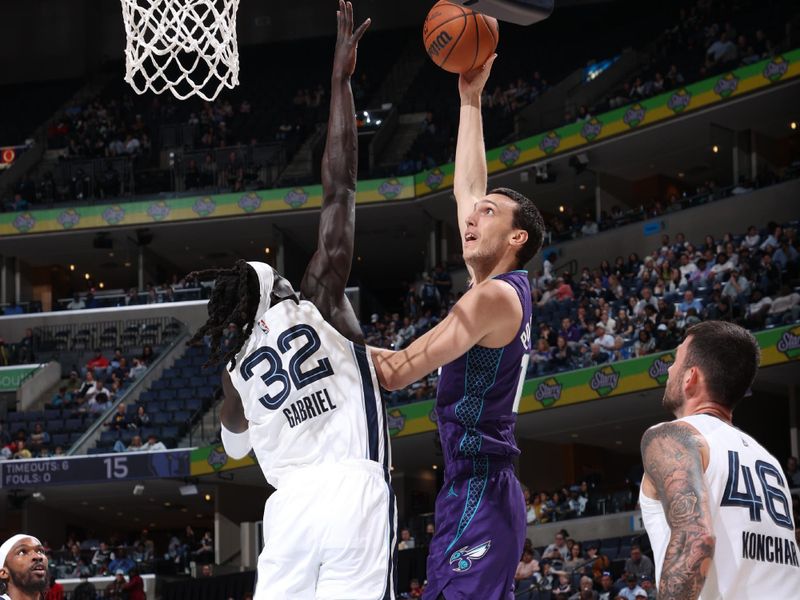MEMPHIS, TN - MARCH 13: Aleksej Pokusevski #17 of the Charlotte Hornets drives to the basket during the game against the Memphis Grizzlies on March 13, 2024 at FedExForum in Memphis, Tennessee. NOTE TO USER: User expressly acknowledges and agrees that, by downloading and or using this photograph, User is consenting to the terms and conditions of the Getty Images License Agreement. Mandatory Copyright Notice: Copyright 2024 NBAE (Photo by Joe Murphy/NBAE via Getty Images)