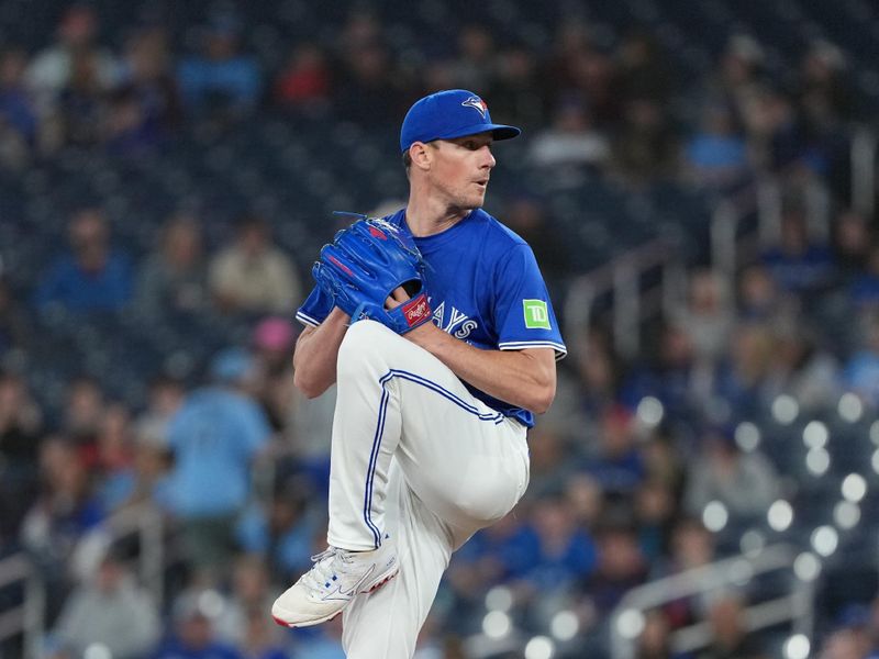 May 20, 2025; Toronto, Ontario, CAN; Toronto Blue Jays starting pitcher Chris Bassitt (40) throws a pitch against the San Diego Padres during the first inning at Rogers Centre. Mandatory Credit: Nick Turchiaro-Imagn Images