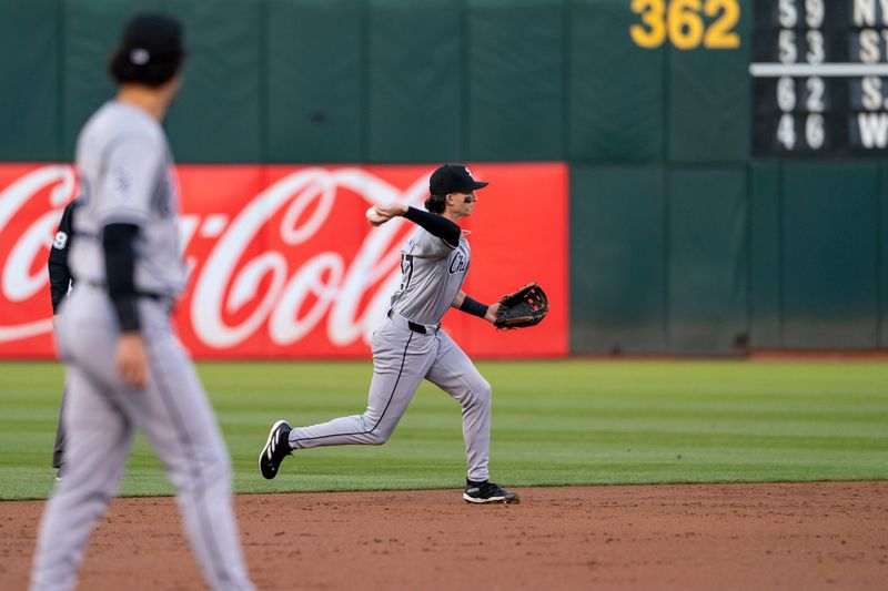 Aug 5, 2024; Oakland, California, USA;  Chicago White Sox shortstop Brooks Baldwin (27) throws out Oakland Athletics left fielder Miguel Andujar (not pictured) during the third inning at Oakland-Alameda County Coliseum. Mandatory Credit: Neville E. Guard-USA TODAY Sports