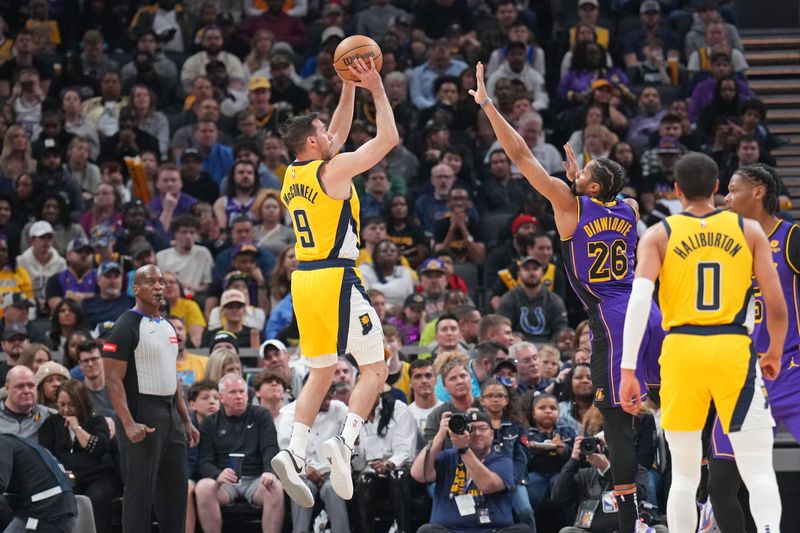 INDIANAPOLIS, IN - MARCH 29: T.J. McConnell #9 of the Indiana Pacers shoots the ball during the game against the Los Angeles Lakers on March 24, 2024 at Gainbridge Fieldhouse in Indianapolis, Indiana. NOTE TO USER: User expressly acknowledges and agrees that, by downloading and or using this Photograph, user is consenting to the terms and conditions of the Getty Images License Agreement. Mandatory Copyright Notice: Copyright 2024 NBAE (Photo by Jesse D. Garrabrant /NBAE via Getty Images)