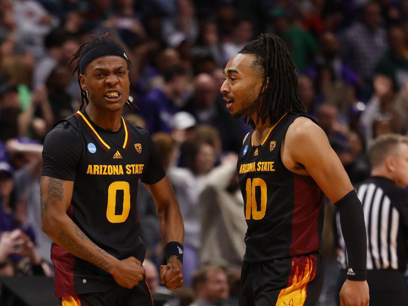 Mar 17, 2023; Denver, CO, USA; Arizona State Sun Devils guard DJ Horne (0) and Arizona State Sun Devils guard Frankie Collins (10) celebrate during the second half against the TCU Horned Frogs at Ball Arena. Mandatory Credit: Michael Ciaglo-USA TODAY Sports