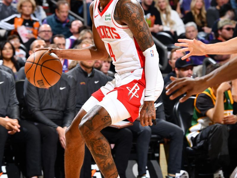 PHOENIX, AZ - MARCH 2: Jalen Green #4 of the Houston Rockets dribbles the ball during the game against the Phoenix Suns on March 2, 2024 at Footprint Center in Phoenix, Arizona. NOTE TO USER: User expressly acknowledges and agrees that, by downloading and or using this photograph, user is consenting to the terms and conditions of the Getty Images License Agreement. Mandatory Copyright Notice: Copyright 2024 NBAE (Photo by Barry Gossage/NBAE via Getty Images)