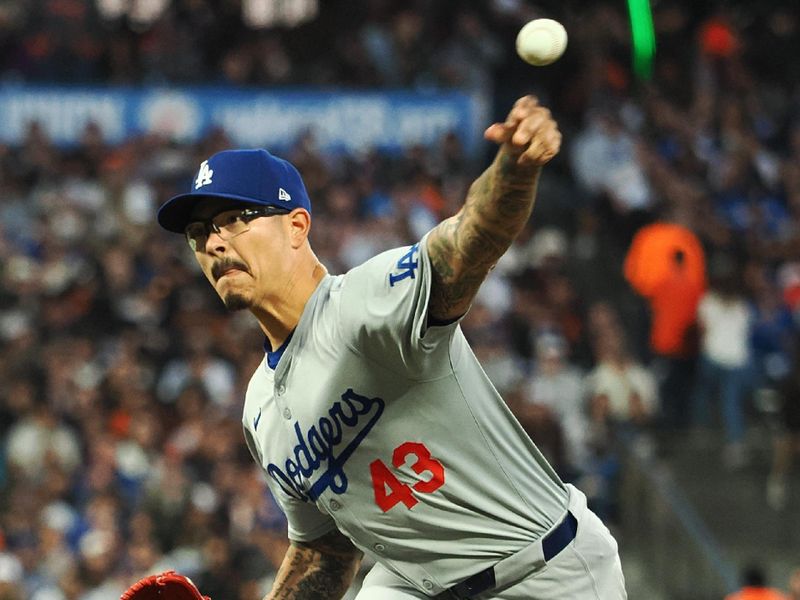 Jun 28, 2024; San Francisco, California, USA; Los Angeles Dodgers relief pitcher Anthony Banda (43) pitches against the San Francisco Giants during the fifth inning at Oracle Park. Mandatory Credit: Kelley L Cox-USA TODAY Sports