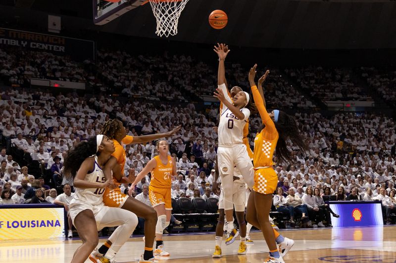 Jan 30, 2023; Baton Rouge, Louisiana, USA;  LSU Lady Tigers forward LaDazhia Williams (0) drives to the basket against Tennessee Lady Vols forward Tess Darby (21) during the first half at Pete Maravich Assembly Center. Mandatory Credit: Stephen Lew-USA TODAY Sports