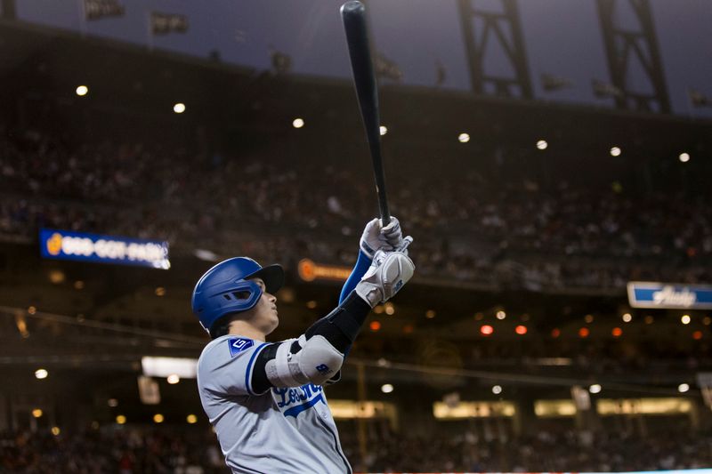 May 15, 2024; San Francisco, California, USA; Los Angeles Dodgers designated hitter Shohei Ohtani (17) on deck before batting against the San Francisco Giants during the seventh inning at Oracle Park. Mandatory Credit: John Hefti-USA TODAY Sports