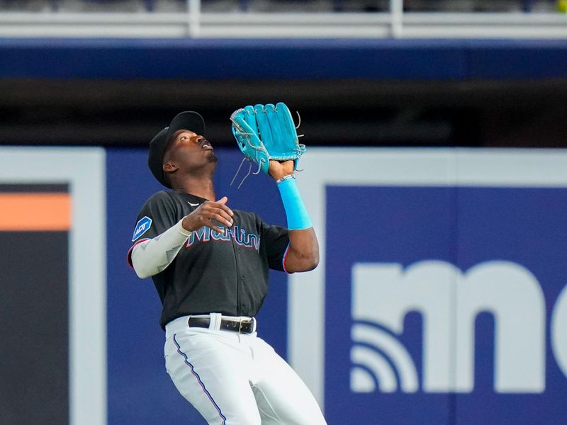 Jun 7, 2023; Miami, Florida, USA; Miami Marlins right fielder Jesus Sanchez (7) catches a fly ball against the Kansas City Royals during the first inning at loanDepot Park. Mandatory Credit: Rich Storry-USA TODAY Sports