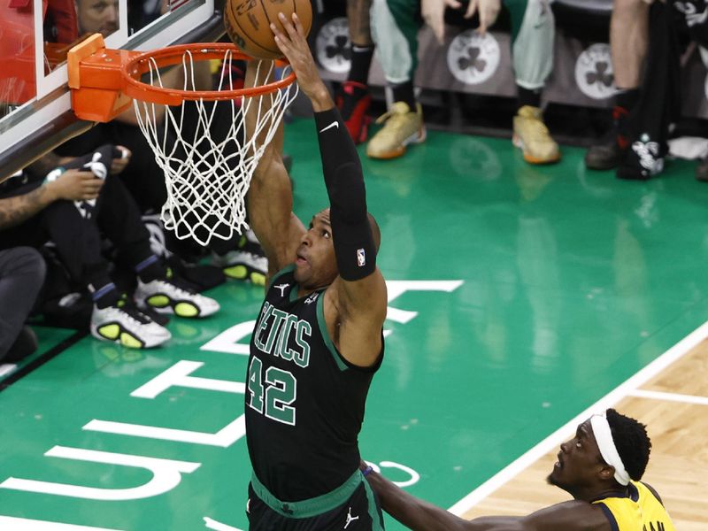 BOSTON, MASSACHUSETTS - MAY 23: Al Horford #42 of the Boston Celtics dunks over Pascal Siakam #43 of the Indiana Pacers during the second quarter in Game Two of the Eastern Conference Finals at TD Garden on May 23, 2024 in Boston, Massachusetts. NOTE TO USER: User expressly acknowledges and agrees that, by downloading and or using this photograph, User is consenting to the terms and conditions of the Getty Images License Agreement. (Photo by Winslow Townson/Getty Images)