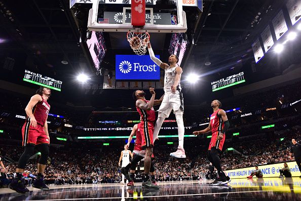 SAN ANTONIO, TX - NOVEMBER 12: Victor Wembanyama #1 of the San Antonio Spurs dunks the ball during the game against the Miami Heat on November 12, 2023 at the Frost Bank Center in San Antonio, Texas. NOTE TO USER: User expressly acknowledges and agrees that, by downloading and or using this photograph, user is consenting to the terms and conditions of the Getty Images License Agreement. Mandatory Copyright Notice: Copyright 2023 NBAE (Photos by Michael Gonzales/NBAE via Getty Images)