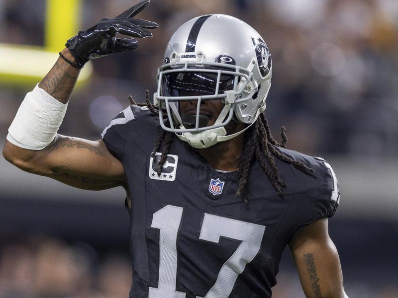 Las Vegas Raiders wide receiver Davante Adams (17) reacts after scoring a touchdown against the Pittsburgh Steelers in an NFL football game, Sunday, Sept. 24, 2023, in Las Vegas, NV. (AP Photo/Jeff Lewis)